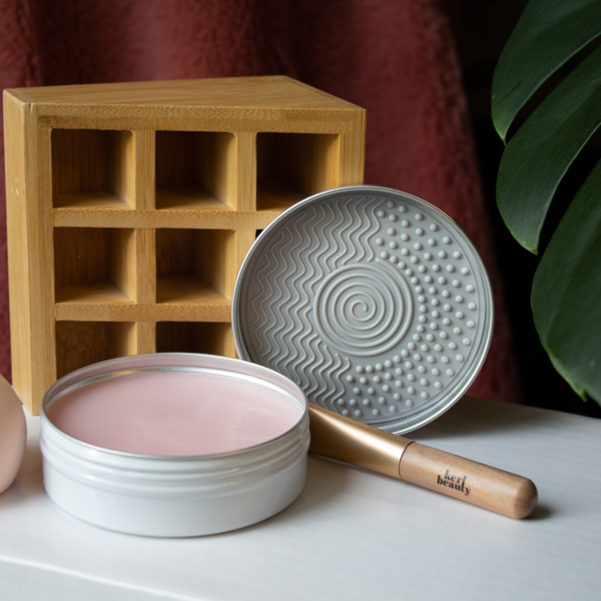 Makeup Brush and Beauty Blender Sponge Solid Cleanser with Silicone Tray showing with Mini Makeup Brush